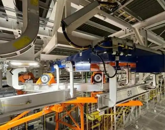 Conveyor roller wheels for vehicle assembly lines